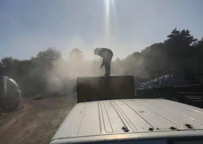 Stripping shipping containers